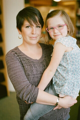 woman holding young girl